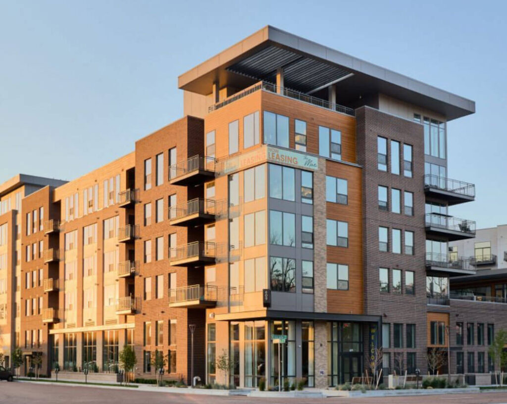 A stunning luxury apartment building in the early light of dawn