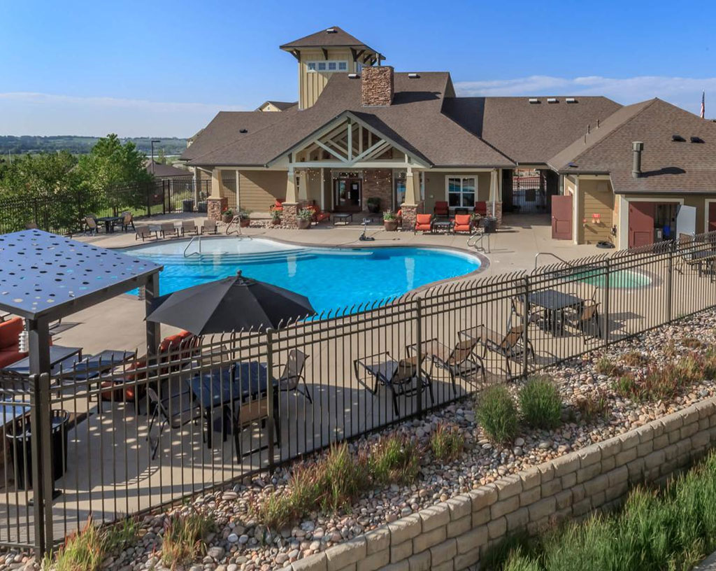 A high-demand apartment complex leasing office and outdoor pool